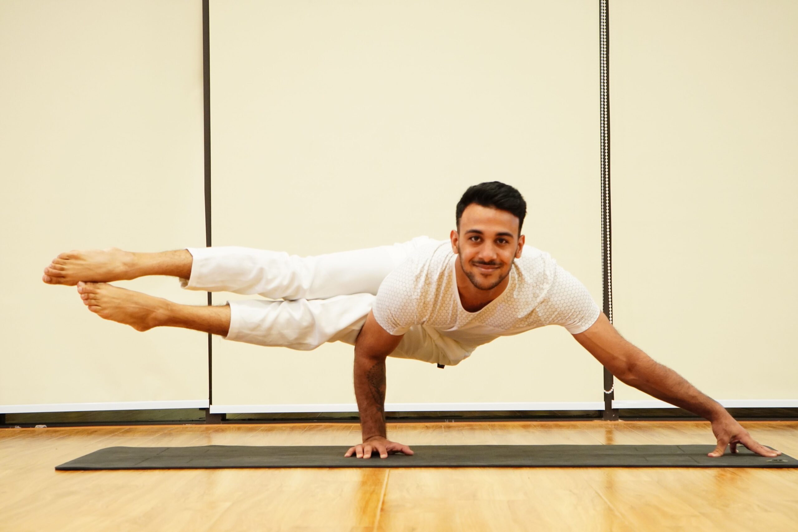 Person in a yoga balance pose, featured/background image for the "Does the Vertigo Program Work?" article